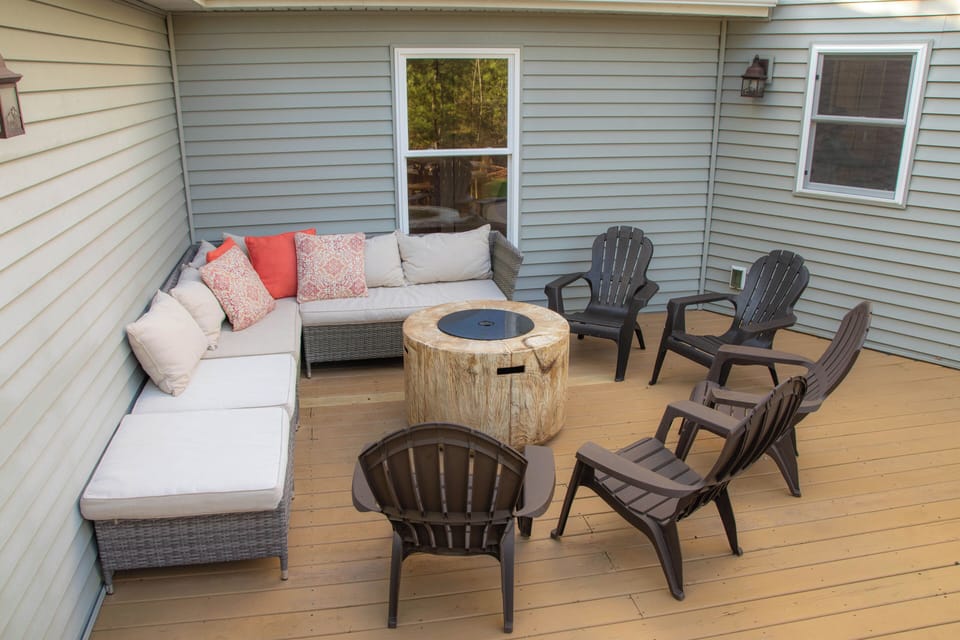 Seasonal fire table area with plenty of seating.