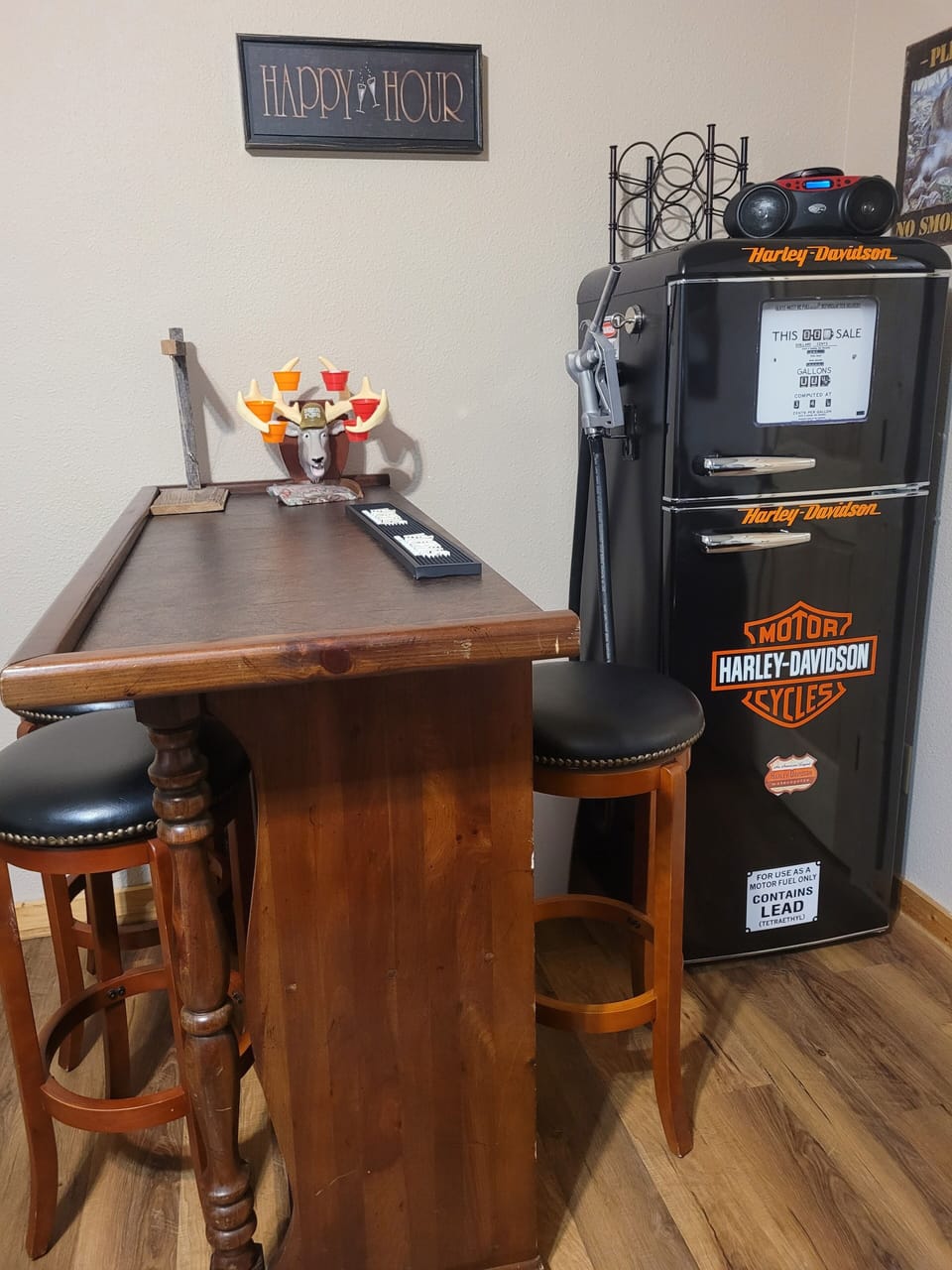 Bar with fridge located in downstairs rec room