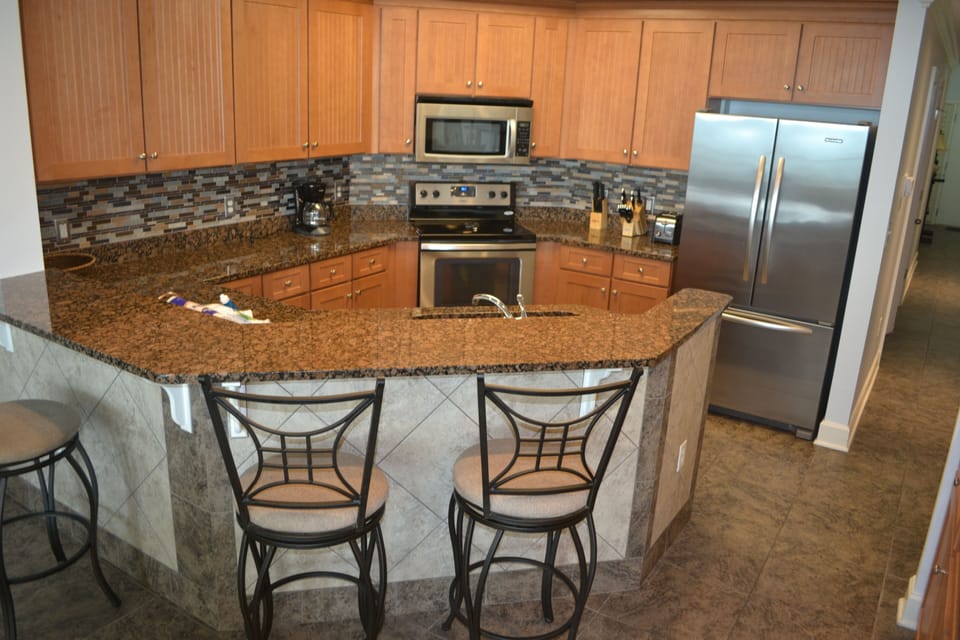 Kitchen with seating at bar