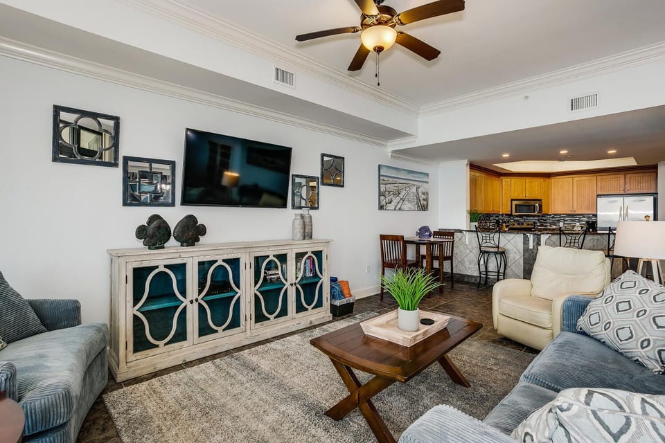 Living room has large TV and DVD 