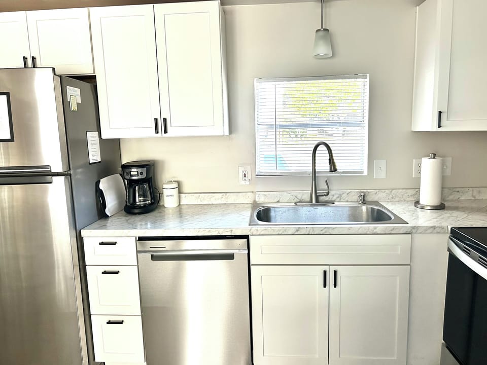 Kitchen is well equipped to cook and serve meals for your family.