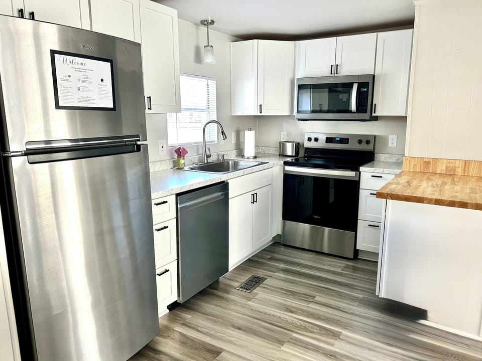 New appliances, smooth top range, dishwasher,  microwave, fridge with ice maker