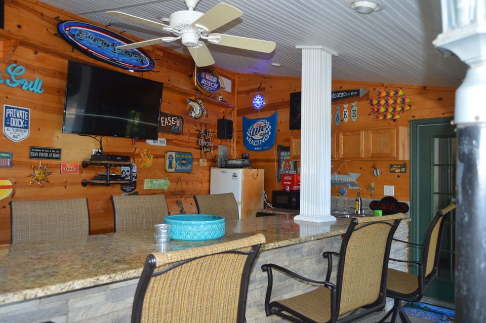 Outdoor bar next to gameroom, bath, fire pit & large deck with plenty of seating