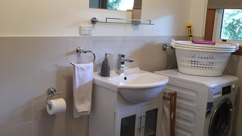 Laundry with second toilet/ hand basin