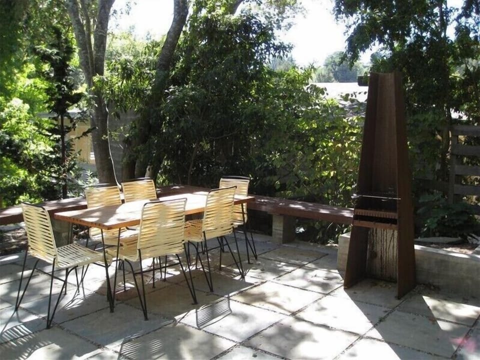 The patio is located off the lower entrance and Master Bedroom
