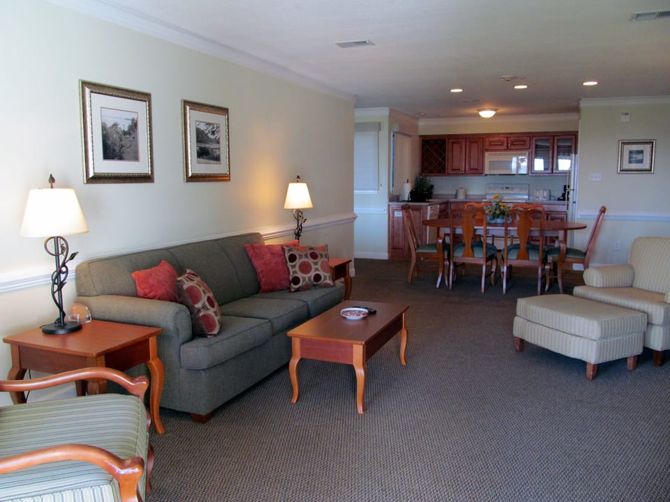 This photo taken from the river front deck shows living, dining and kitchen area