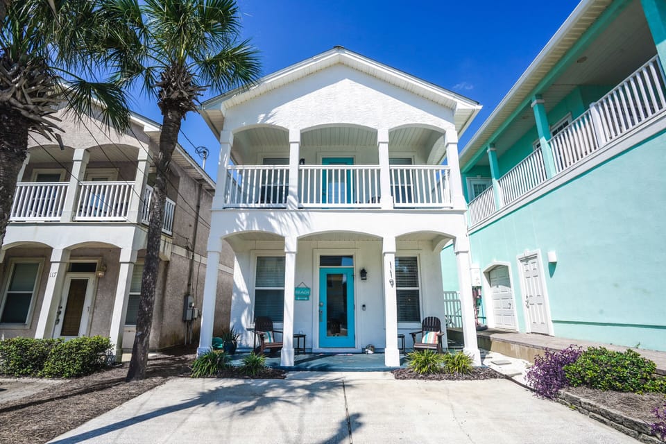 119 Riviera Drive -- blue door, two porches and impeccably maintained.