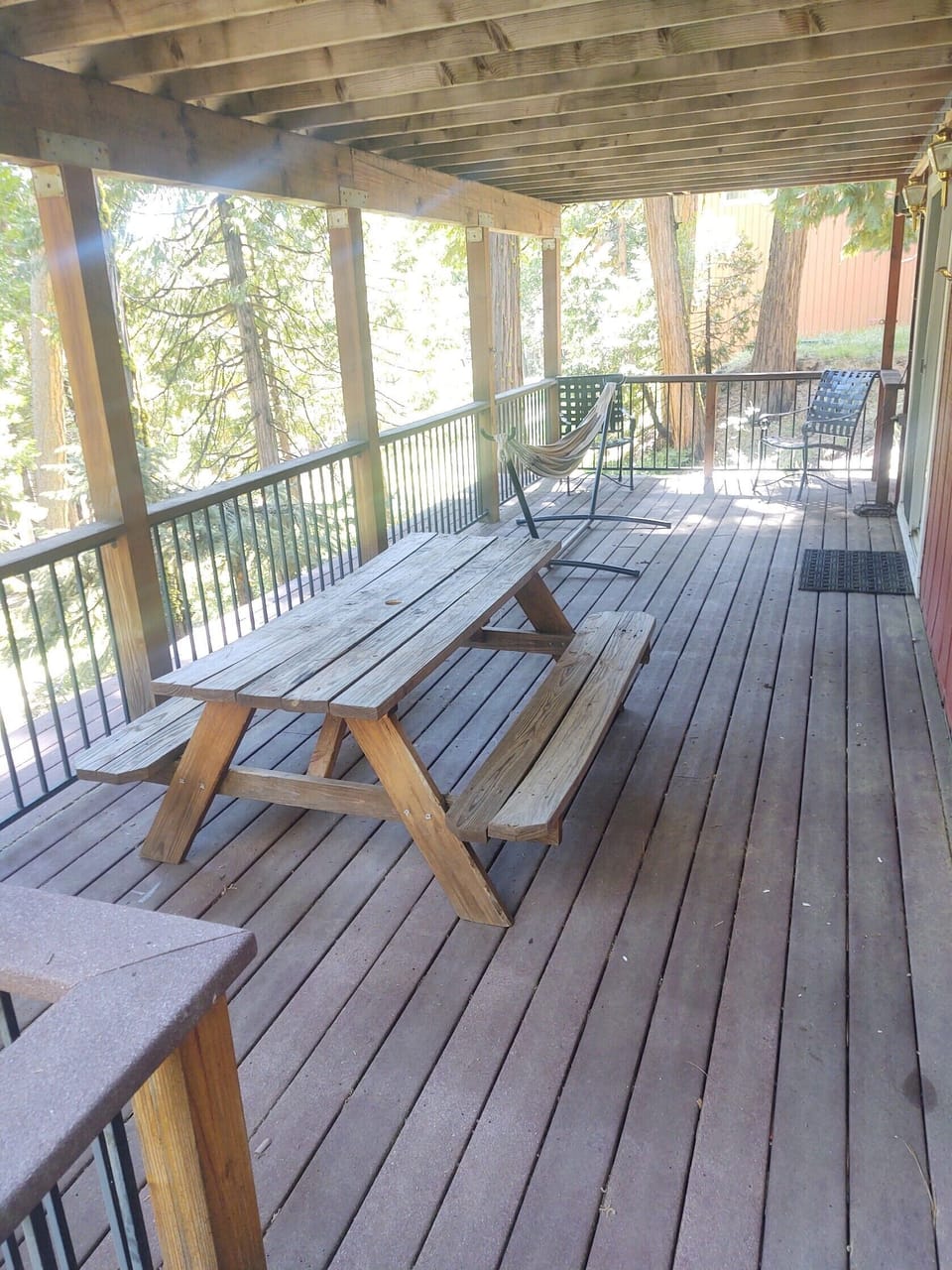 Huge lower deck with hammock and picnic table to relax!