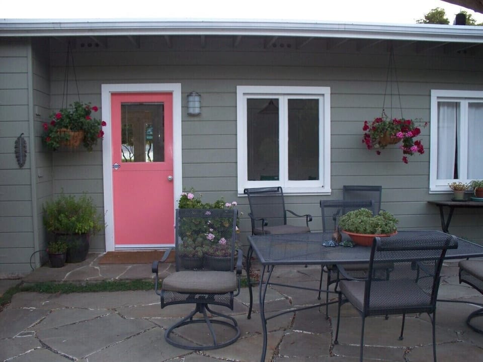 The back patio, and entrance to the kitchen.