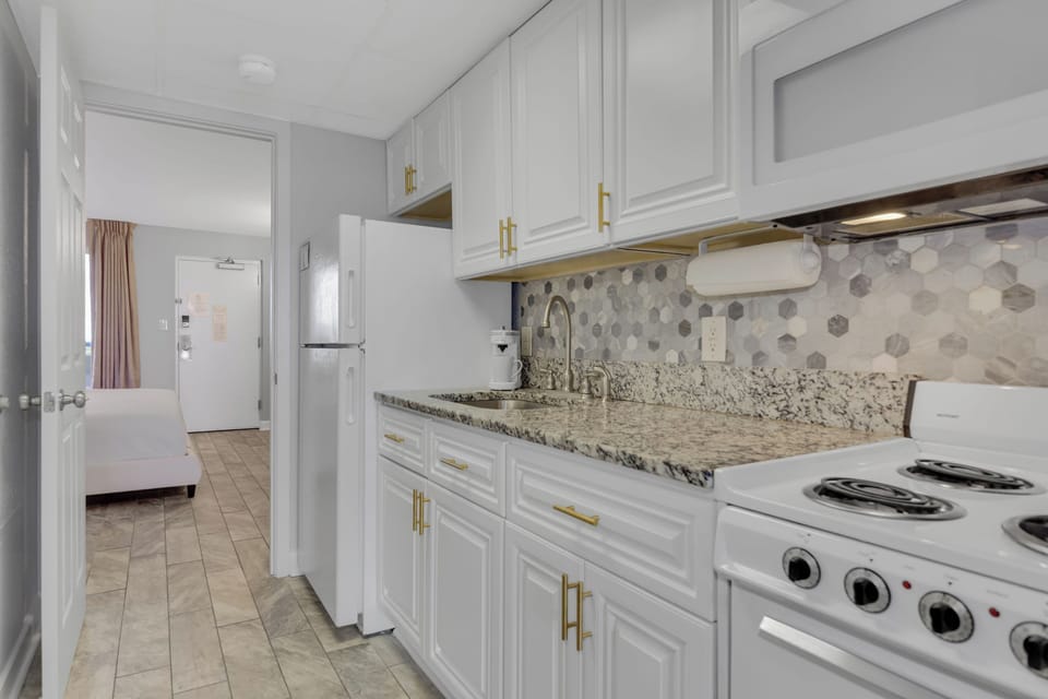 Cook up a storm in our fully equipped kitchen with ocean vistas!