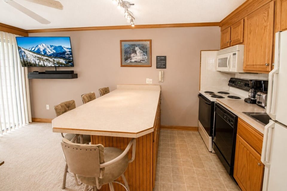 Kitchen island with stools
