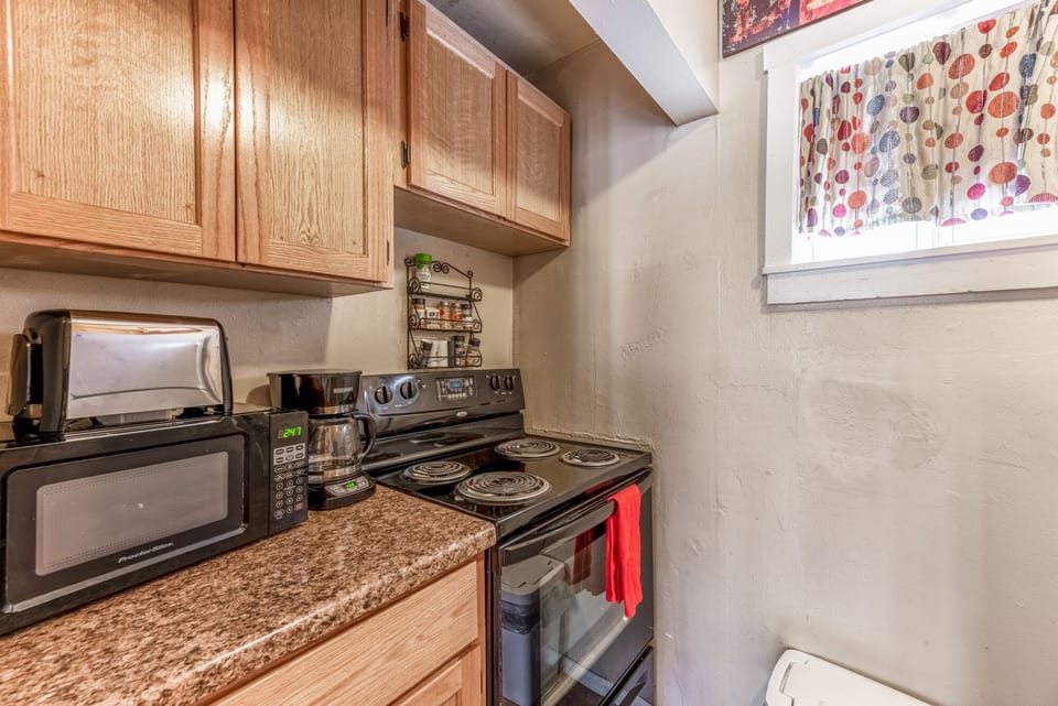 Full size stove/oven and all the small appliances you need.