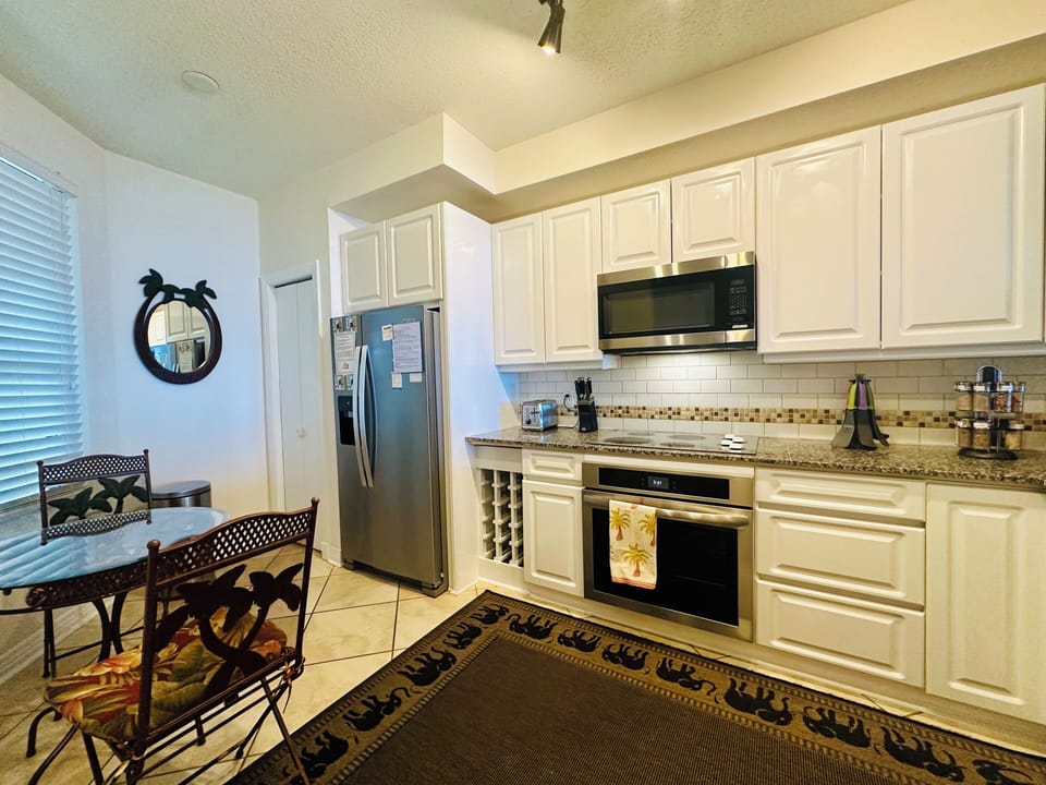 Kitchen is Outfitted with Granite Counter tops and a full set of Appliances