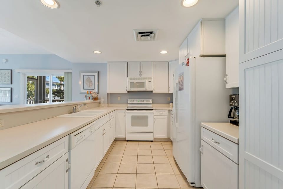High-end Appliances and incredibly well-stocked Kitchen.
