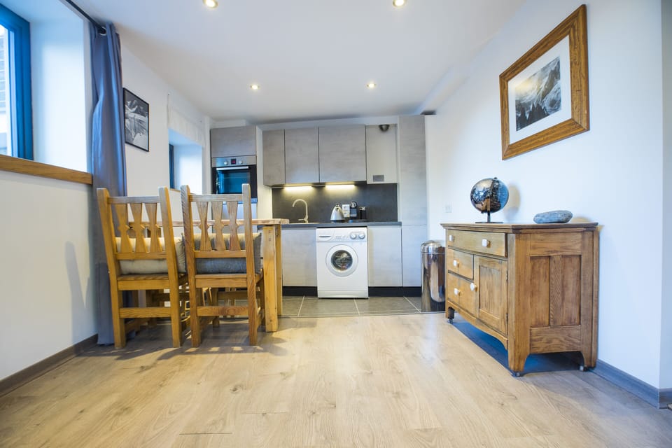 Lower Ground Floor Living Room with fitted kitchen.