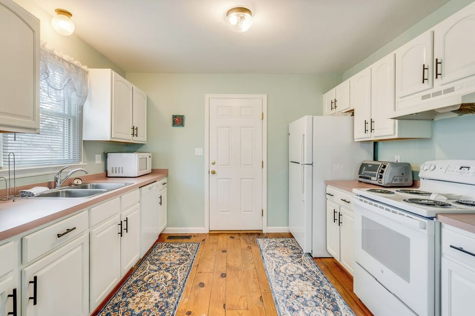 The newly renovated Kitchen will delight the Chef in your family.