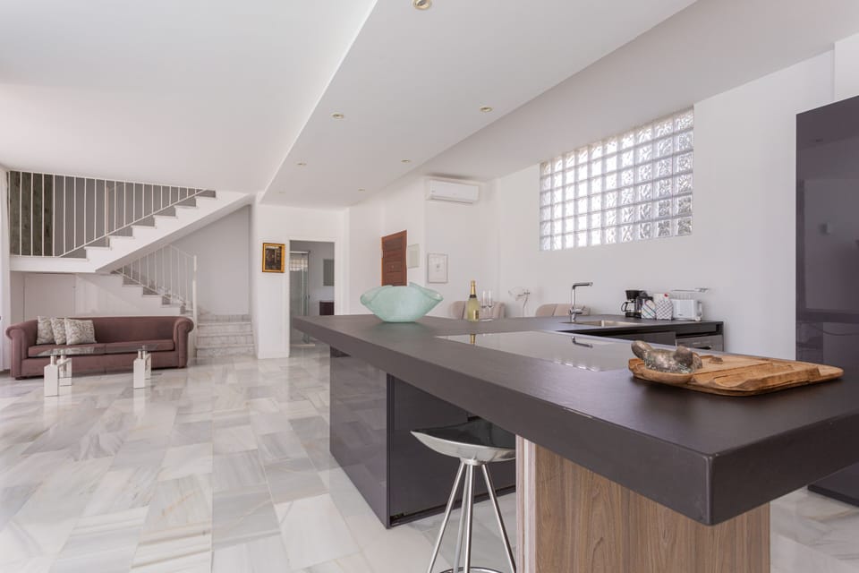 Airy and bright kitchen and part of the living room.. Let's cook all together!