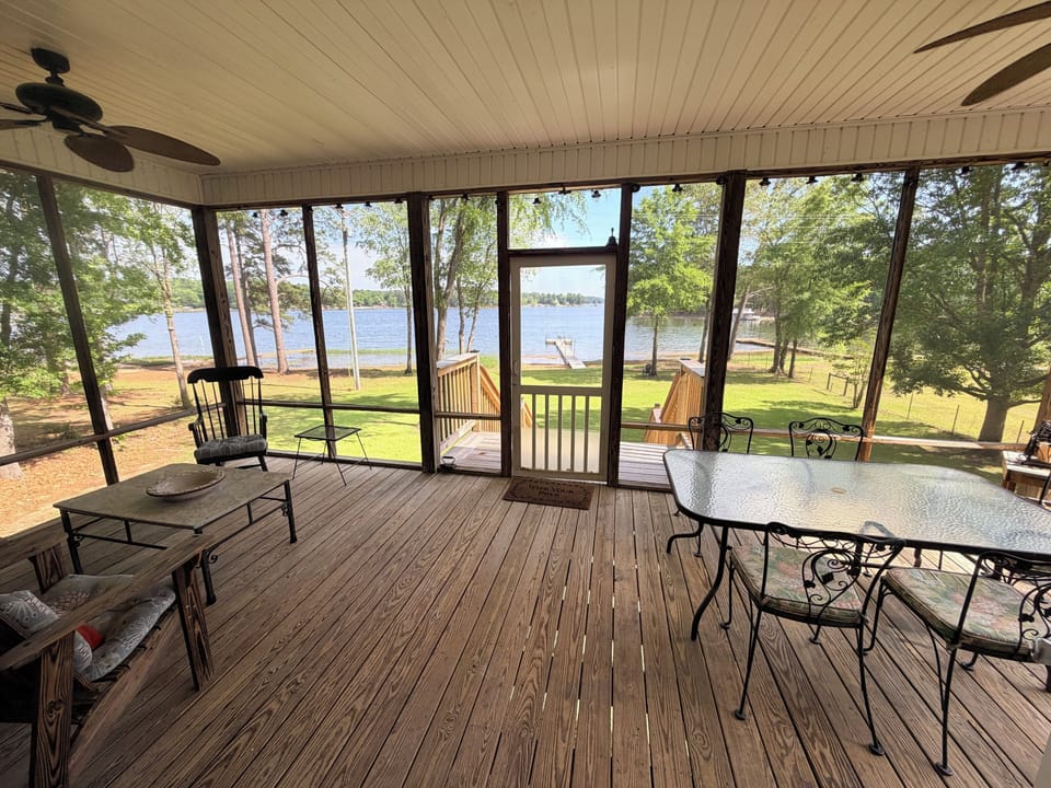 Screen Porch with sitting and eating areas