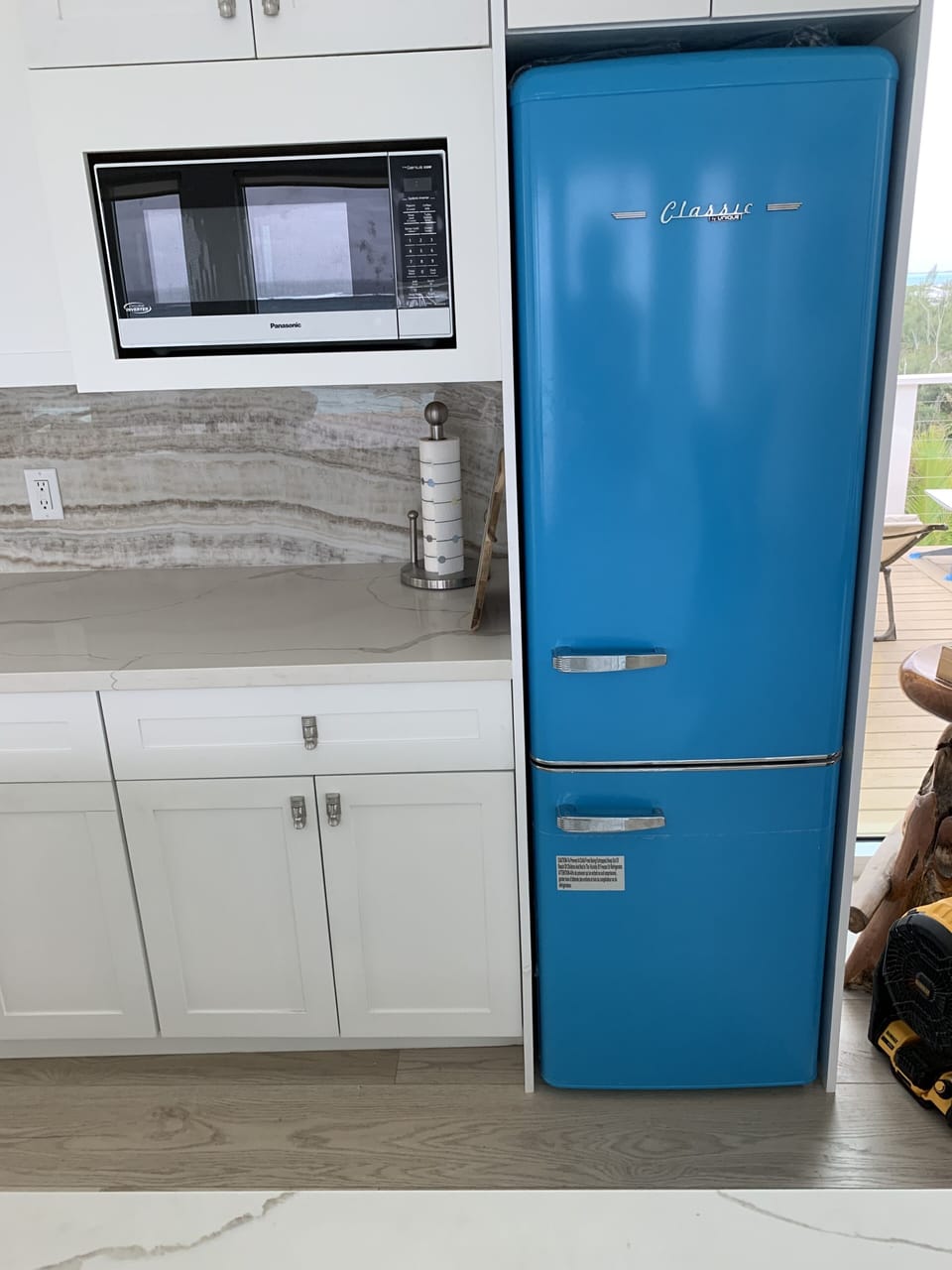 Kitchen with Retro Blue Refrigerator & Full Size Microwave