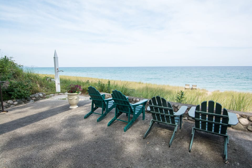 World class Lake Michigan sunsets from  beach dunes pull up an Adirondack chair
