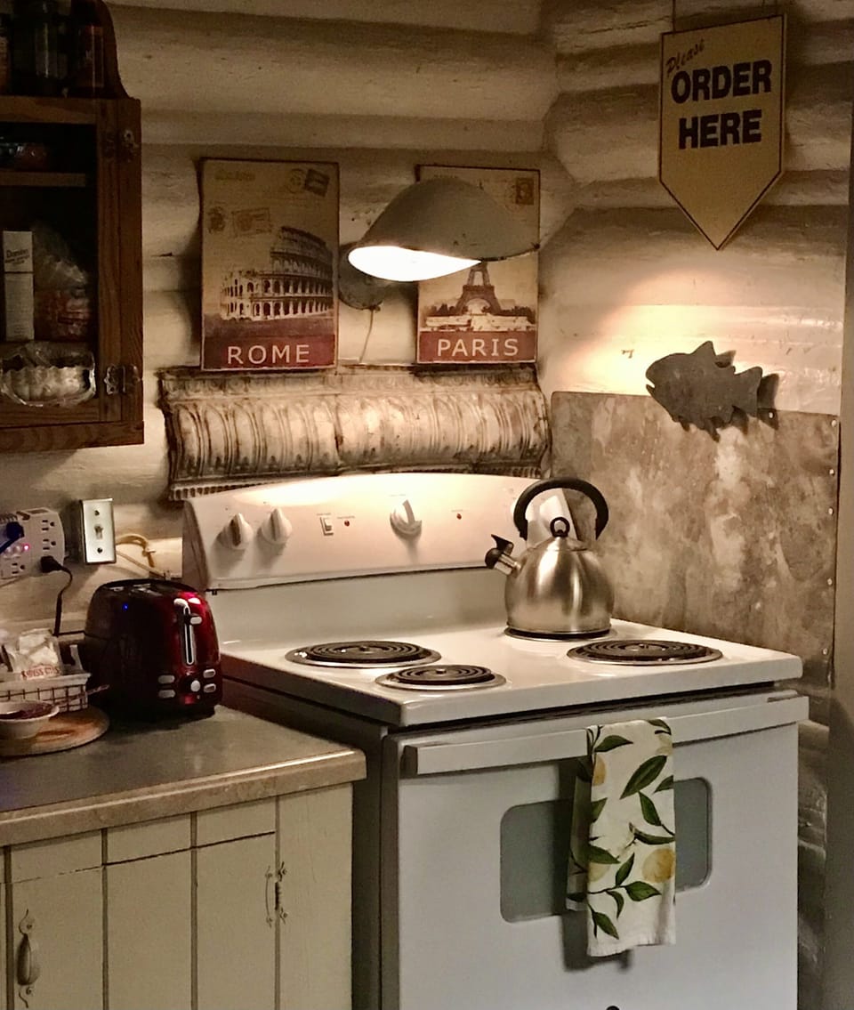 new stove with fun vintage industrial light, 
Order up!