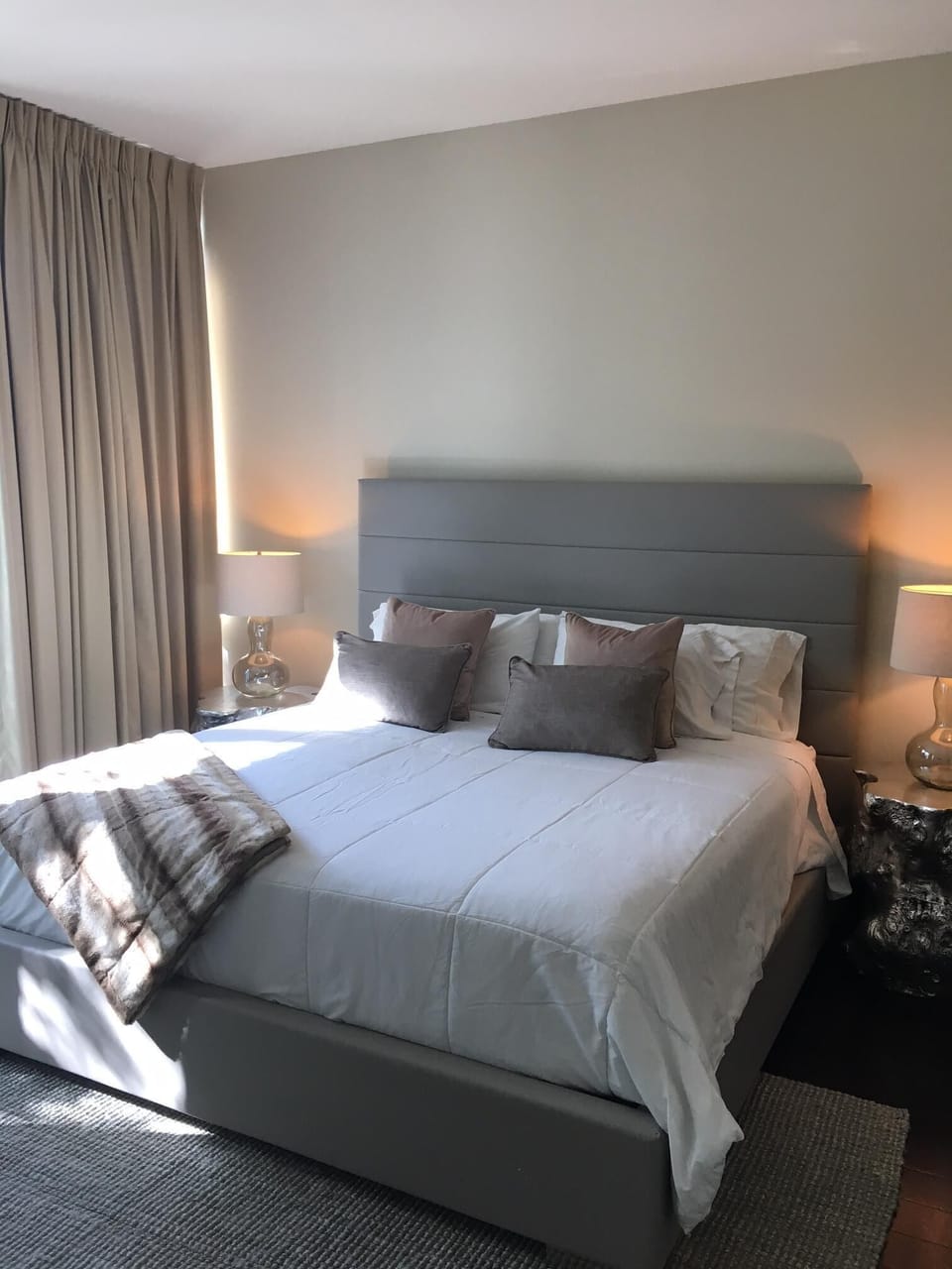 master bedroom king bed and balcony