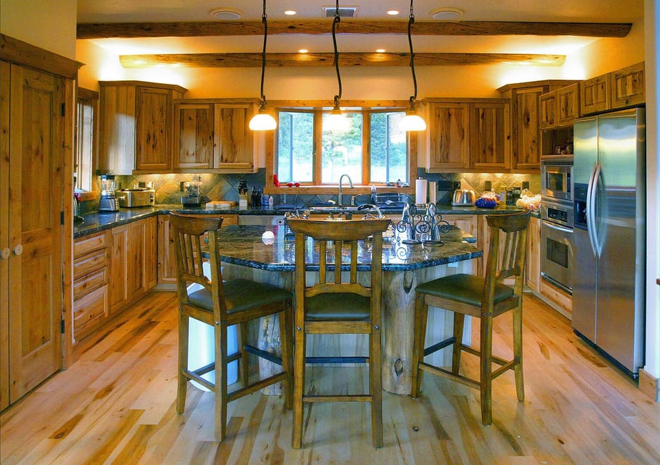 gourmet hickory kitchen with cooktop granite