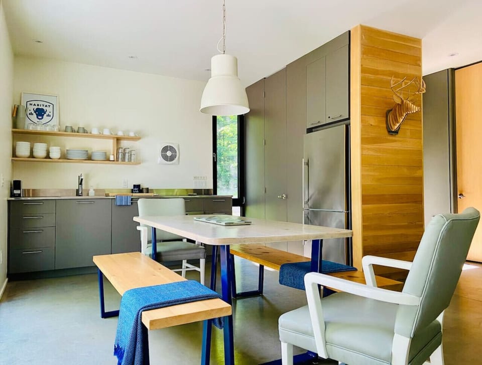 Bright, modern kitchen and dining area for easy meals.
