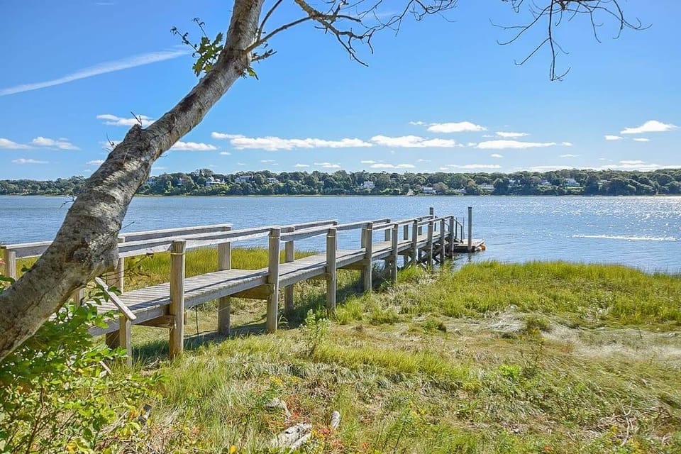dock stretching into the cove