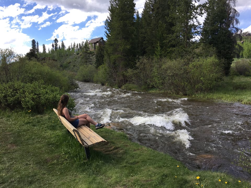 Relax and read by the river, steps from our front door.
