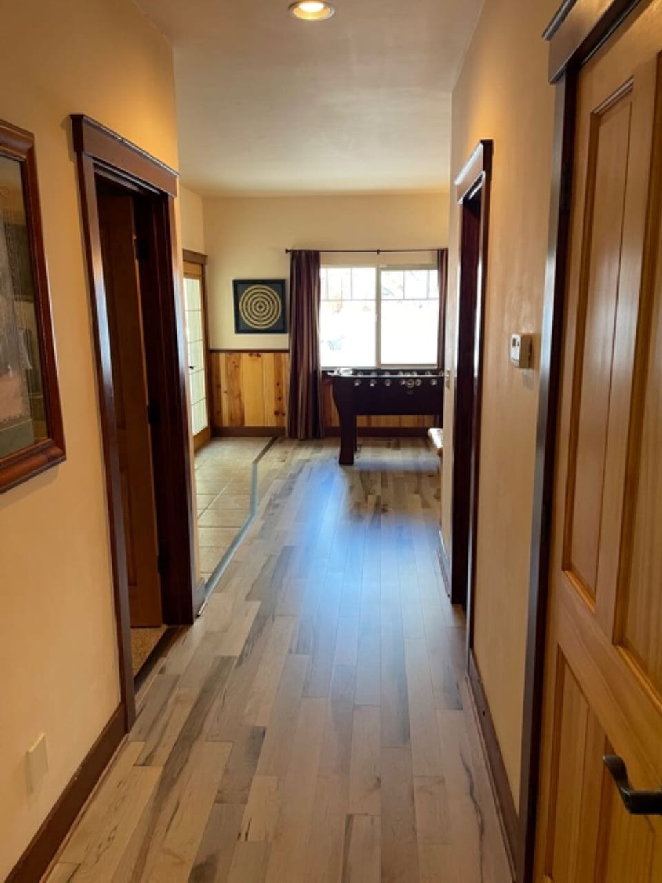 Downstairs entry hall with previous foosball table