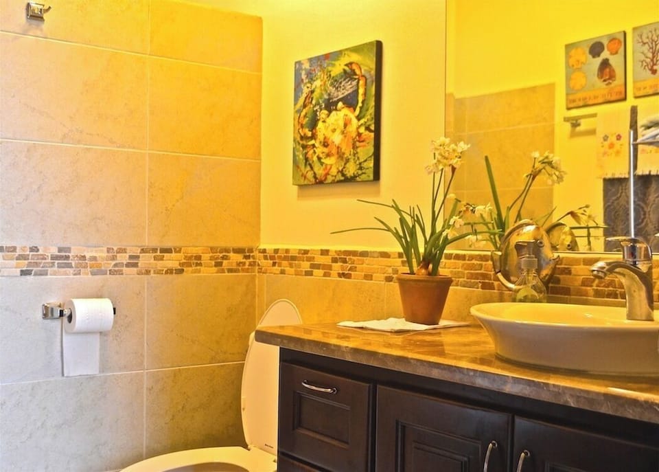 Shared bathroom with large shower