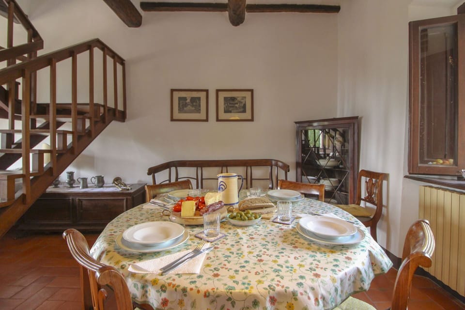 Furniture, Interior Design, Wood, Flooring, Table, Room, Ceiling, Floor, Picture Frame, Lighting