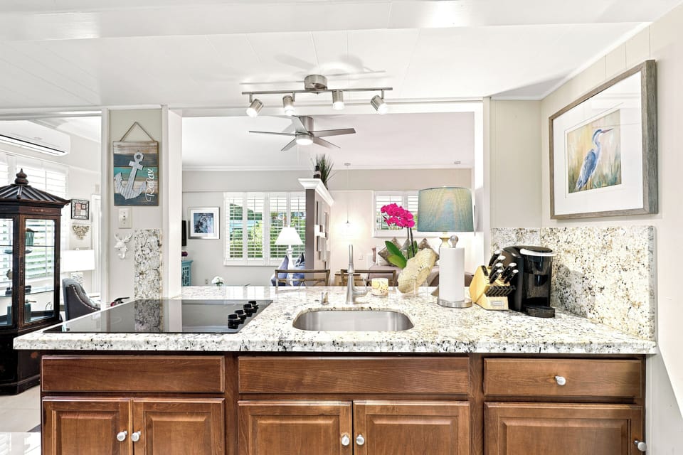 Kitchen is open to living room and bedroom. Open concept layout