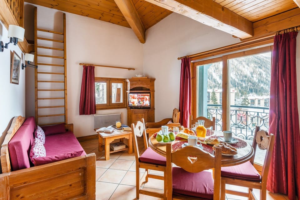 Kick back your feet and relax in the cozy living area.