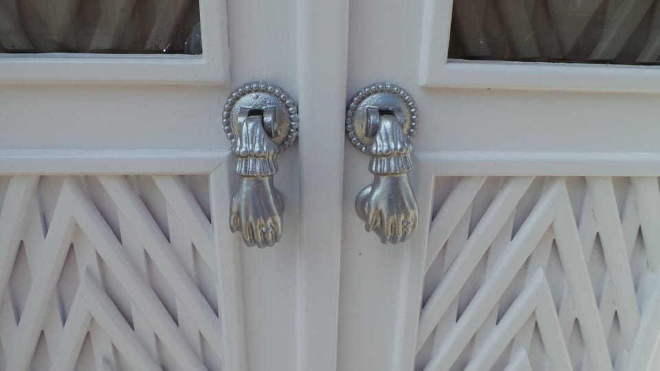 'Hand of Fatima door knockers