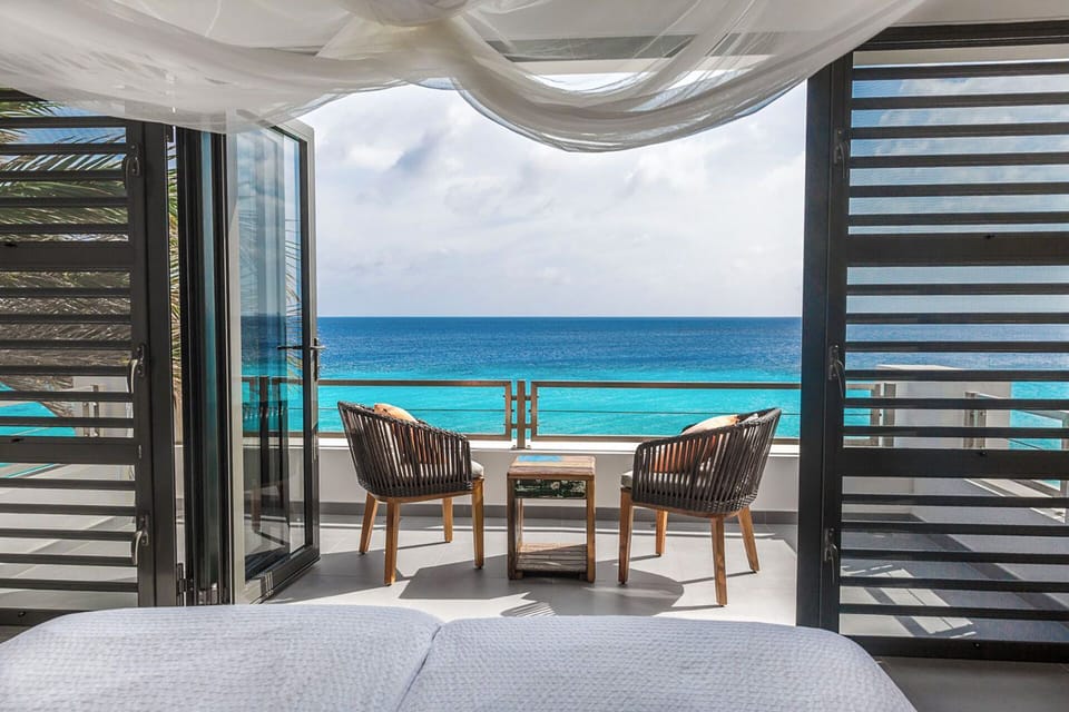 Master bedroom with balcony on top floor