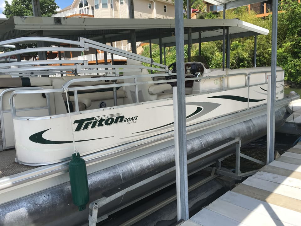 One of our two pontoon boats available for rent to our guests.