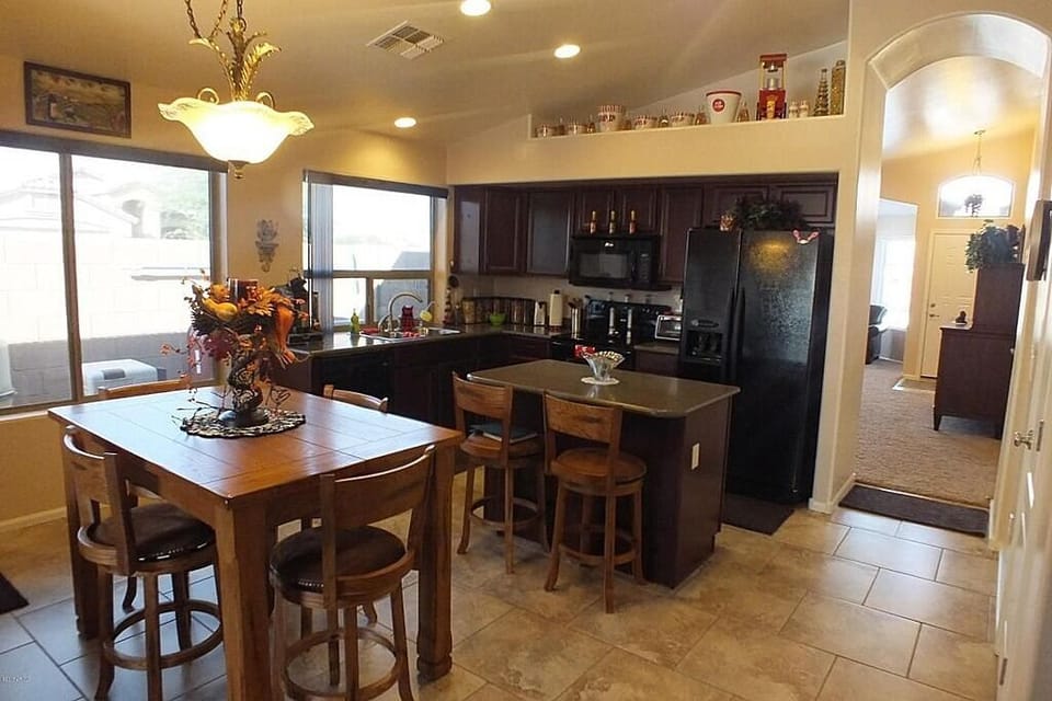 Kitchen/Dining Area. Counter Height Table w/6 stools