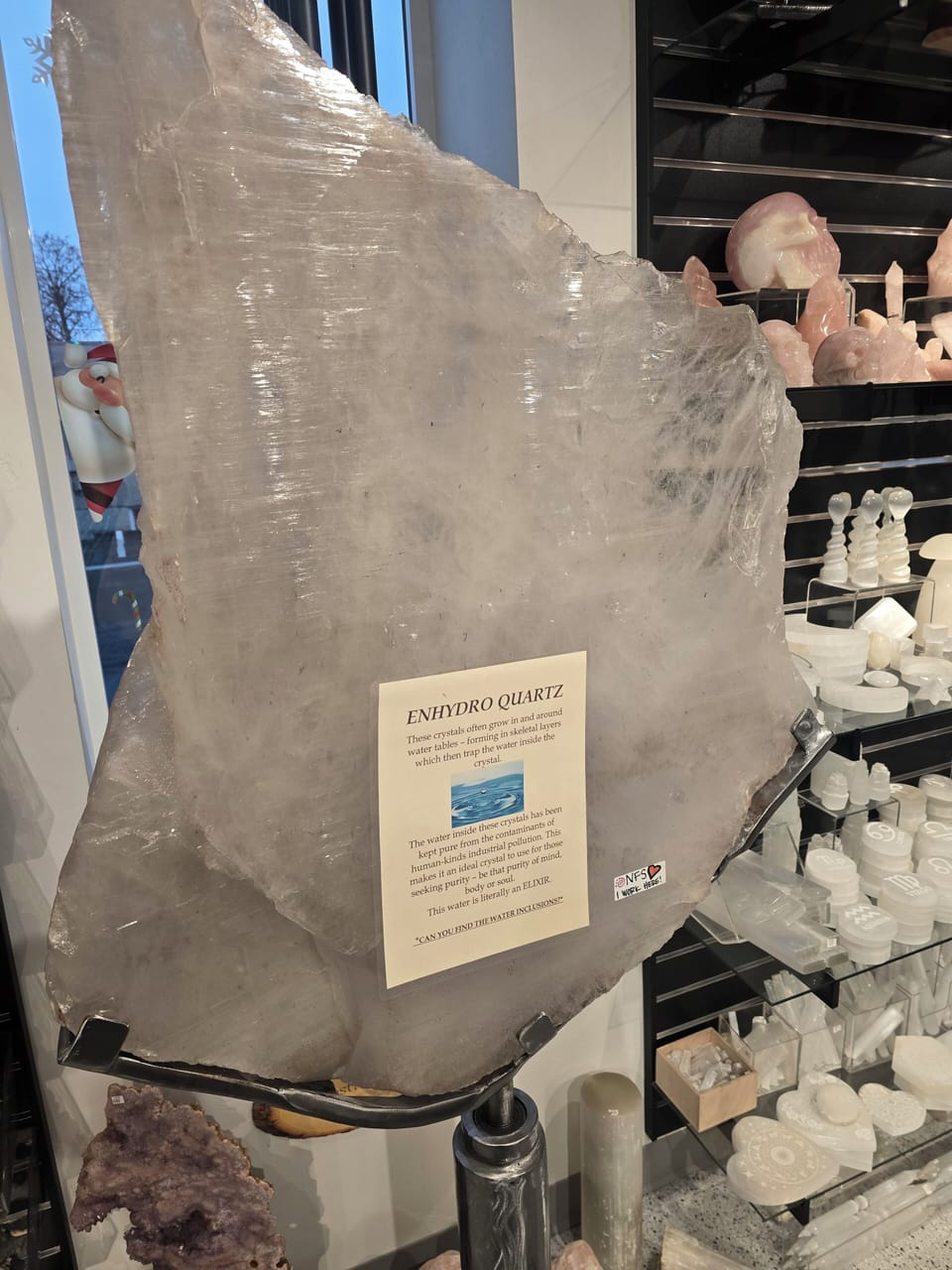 This beautiful Enhydro is located in our crystal shop.. 