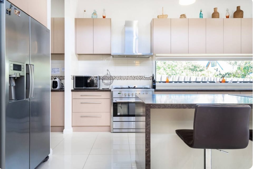 Kitchen large fridge with water & I've dispenser, Microwave & large oven
