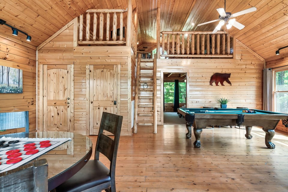 Sleeping loft accessed by a real log ladder