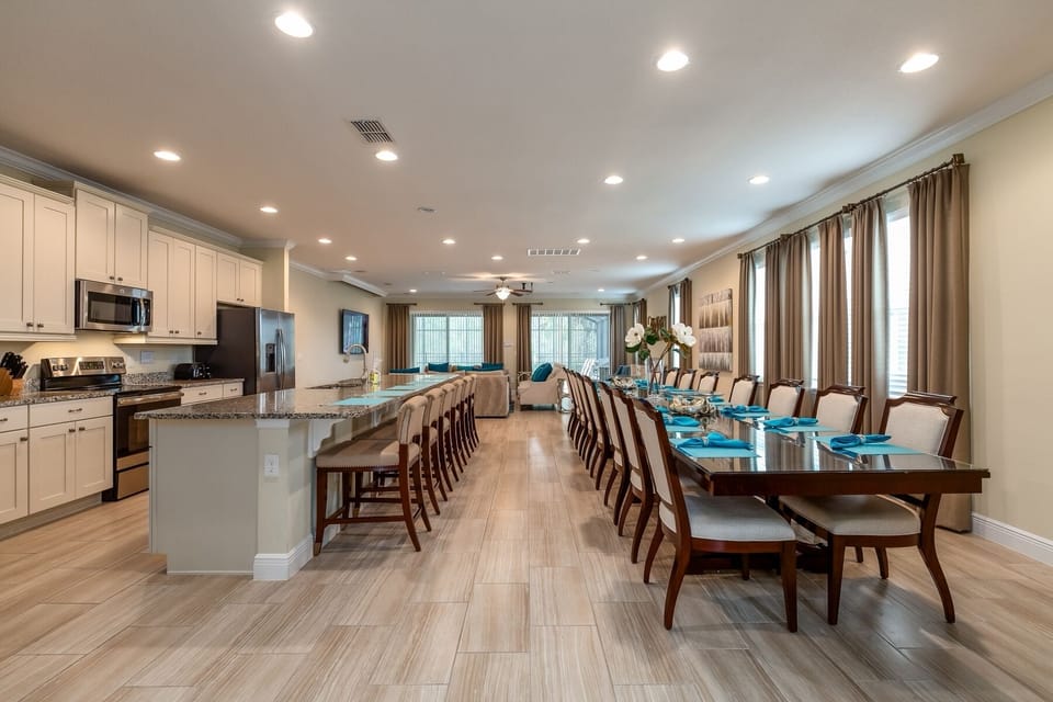 Everyone can dine together at the formal dining table with seating for 16