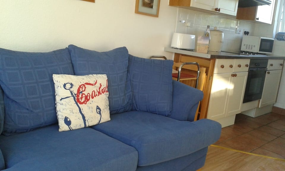 Relax on the comfy sofa after a busy day at the beach.