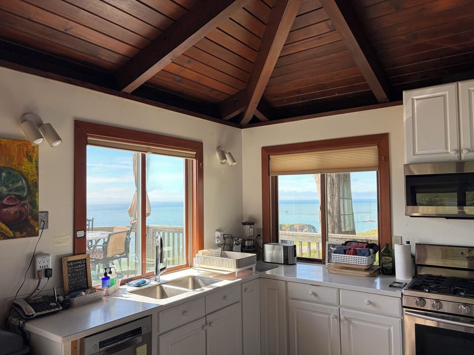 Kitchen opens with 2 corner windows