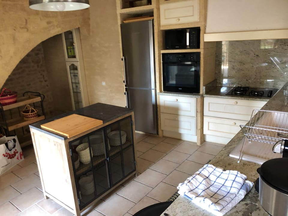 Main kitchen all equipped attached to dining room