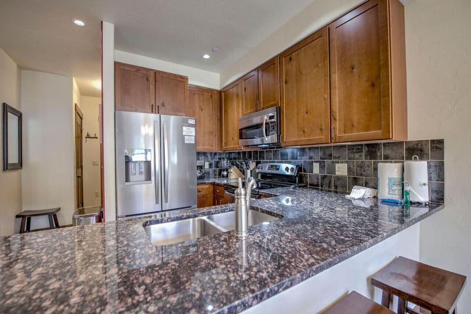 The bar area makes it easy to socialize while you cook.