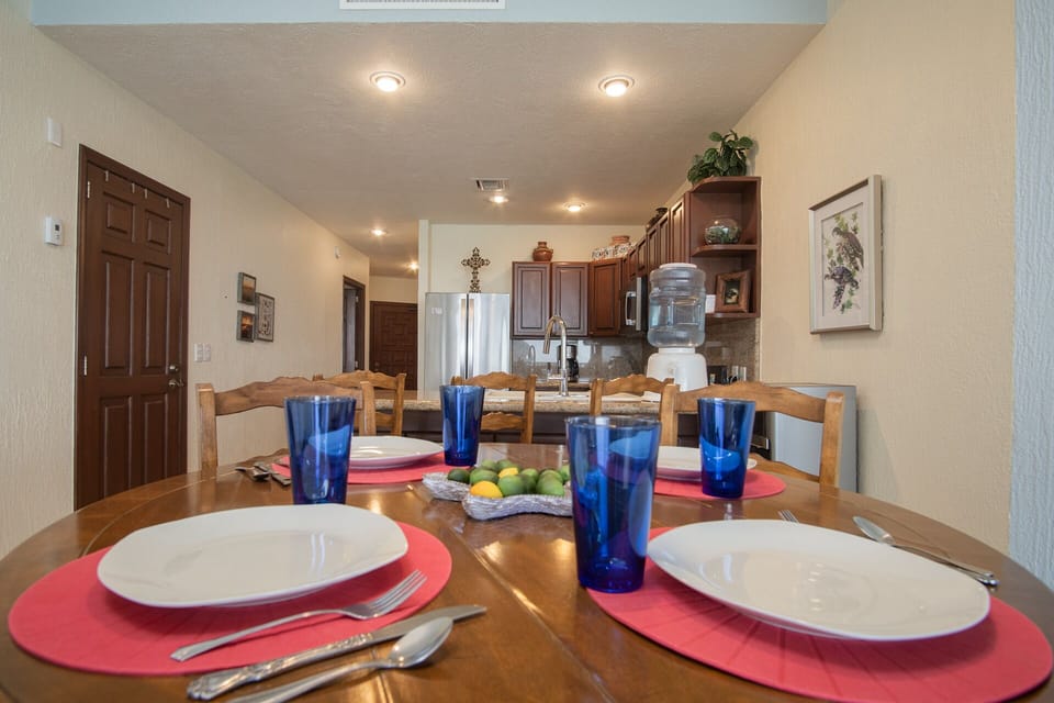 dining table with the kitchen