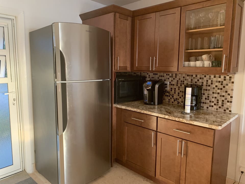 right side of the kitchen with Keurig coffee machine 