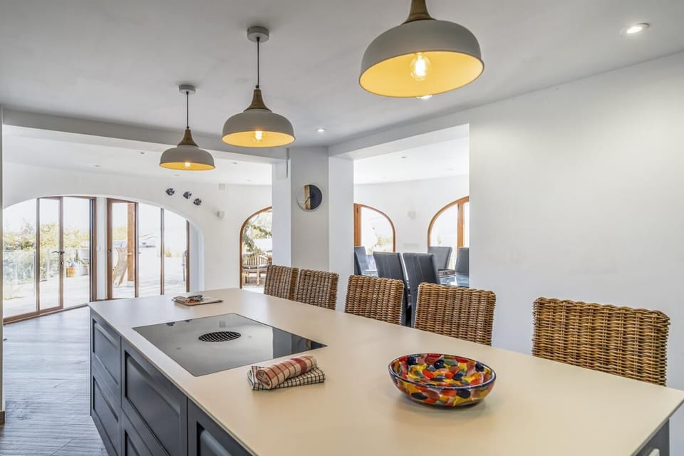 New in 2022 comfortably seats 13. Room opens to huge covered dinning terrace 